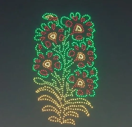 Drone light show forming a flowering plant