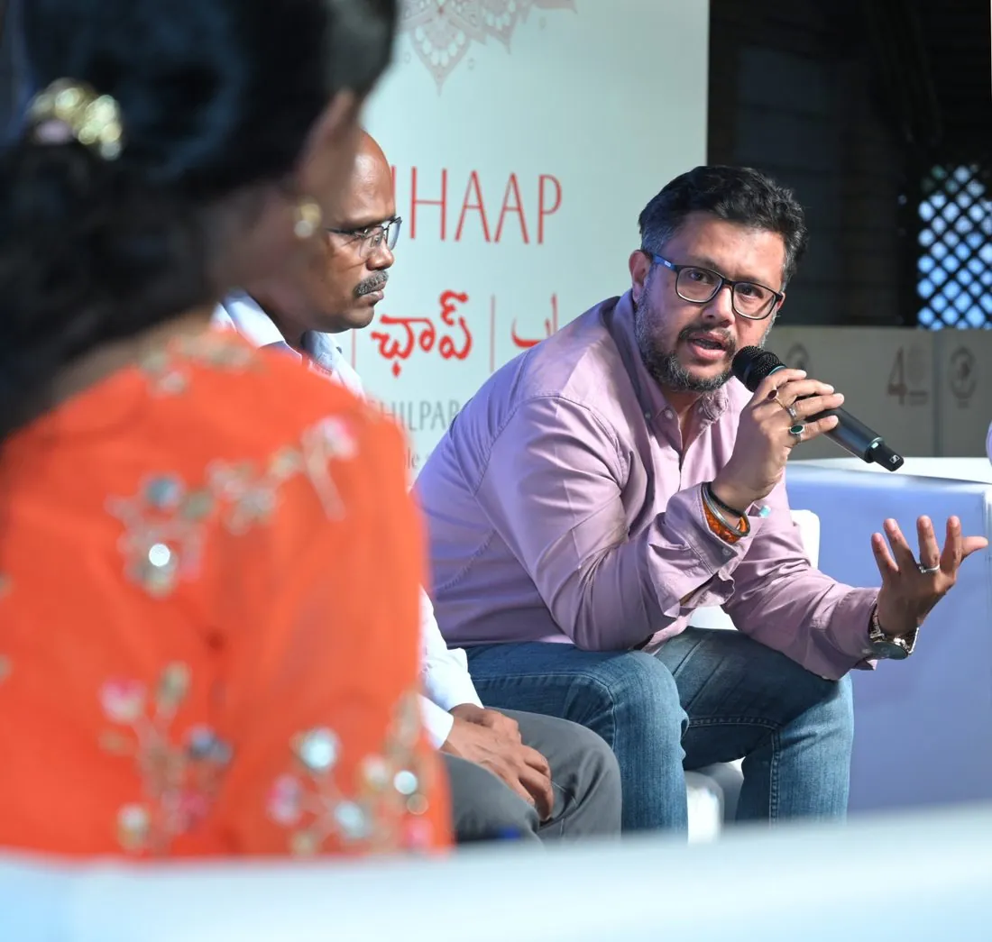 Panellists in discussion on stage at CHHAAP